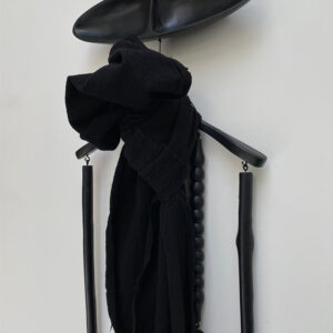 Oversized boiled woolen scarf with raw edges