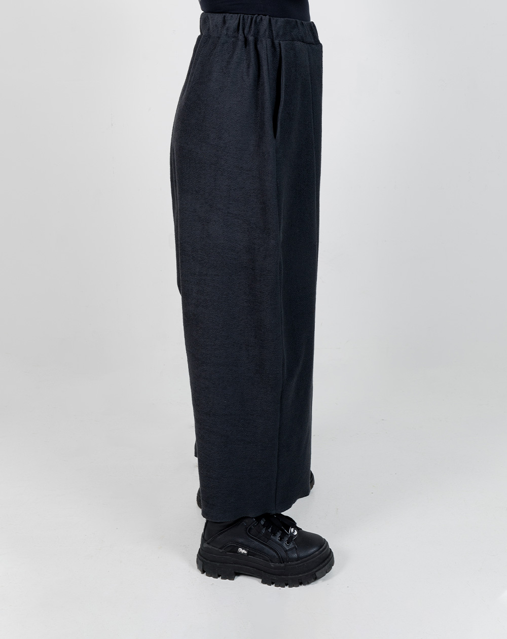 side view of ANTS. SAKE women's oversized sweatpants in phantom grey