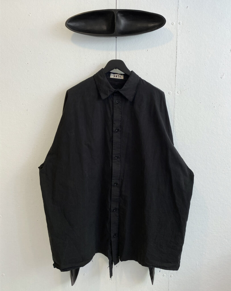 Oversized black washed cotton unisex shirt with raw edge details