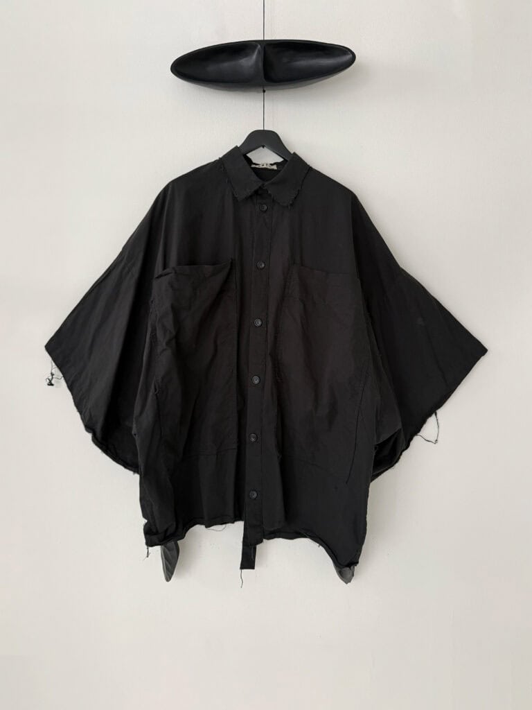 Frontside of Oversized black washed organic cotton boxy shirt with kimono sleeves